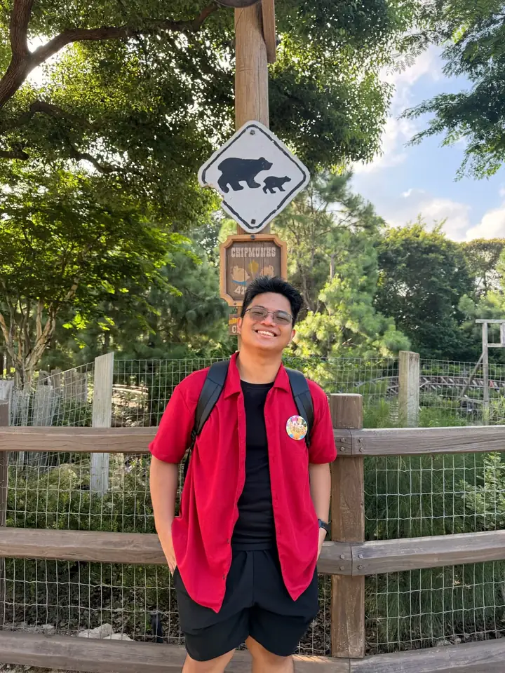 Francis Glenn Hernandez smiling outdoors